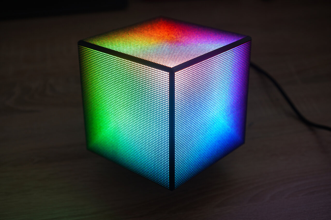 Photo of an LED cube with a color gradient across all sides.