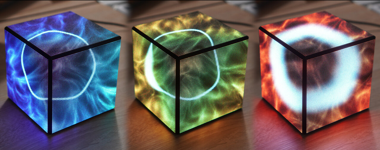 Three photo of my LED cube in different states from left to right. The left-most has a thin white ring on top of a blue-patterned background. The ring of the center image has a bulge at one side and the background is dominated by green and yellow colors. The photo on the right-hand side shows a cube with a very thick ring on a red background.